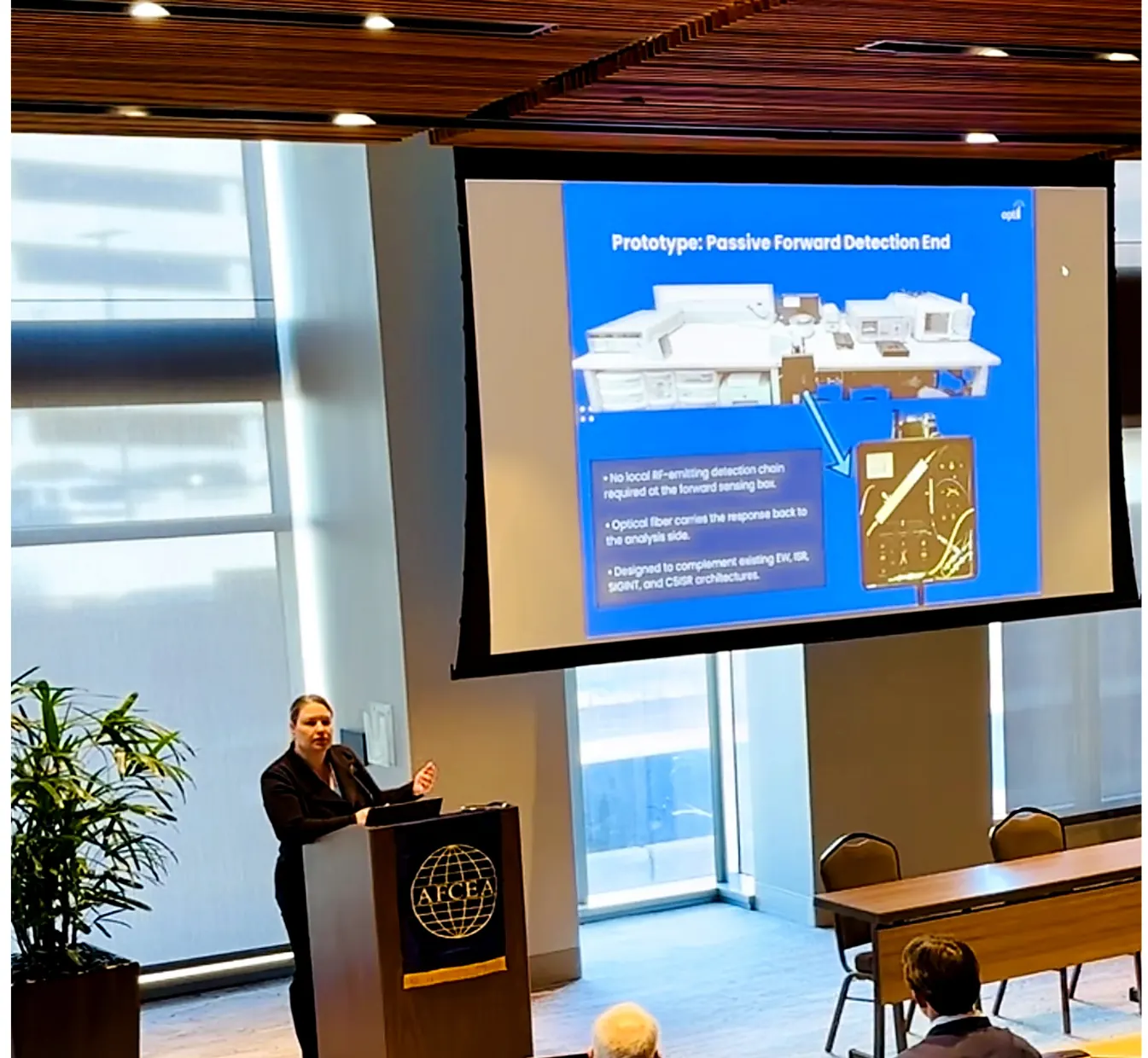 Dr. Daisy Williams speaking at an AFCEA event.
