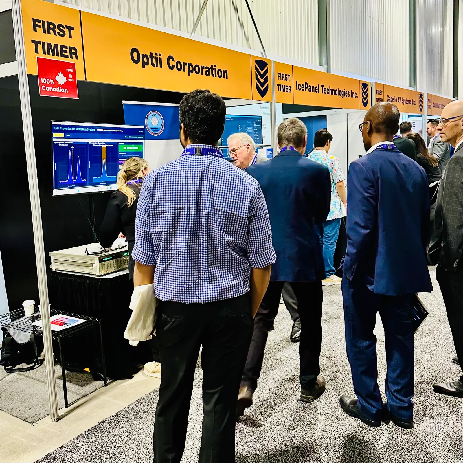 Visitors gathered at the Optii CANSEC 2026 booth.