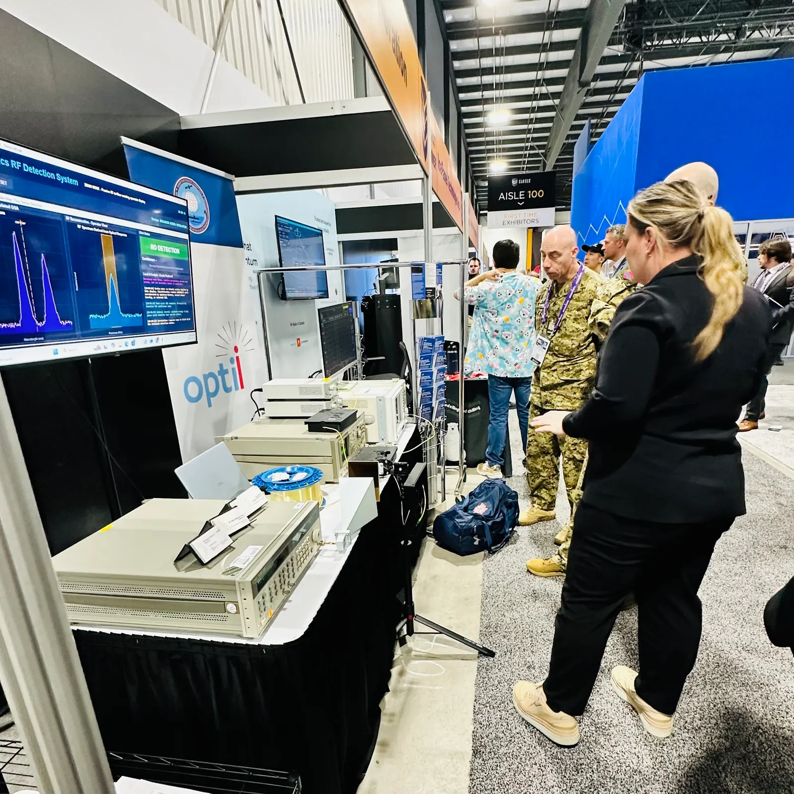 Optii demonstrating passive photonic RF sensing technology at CANSEC.