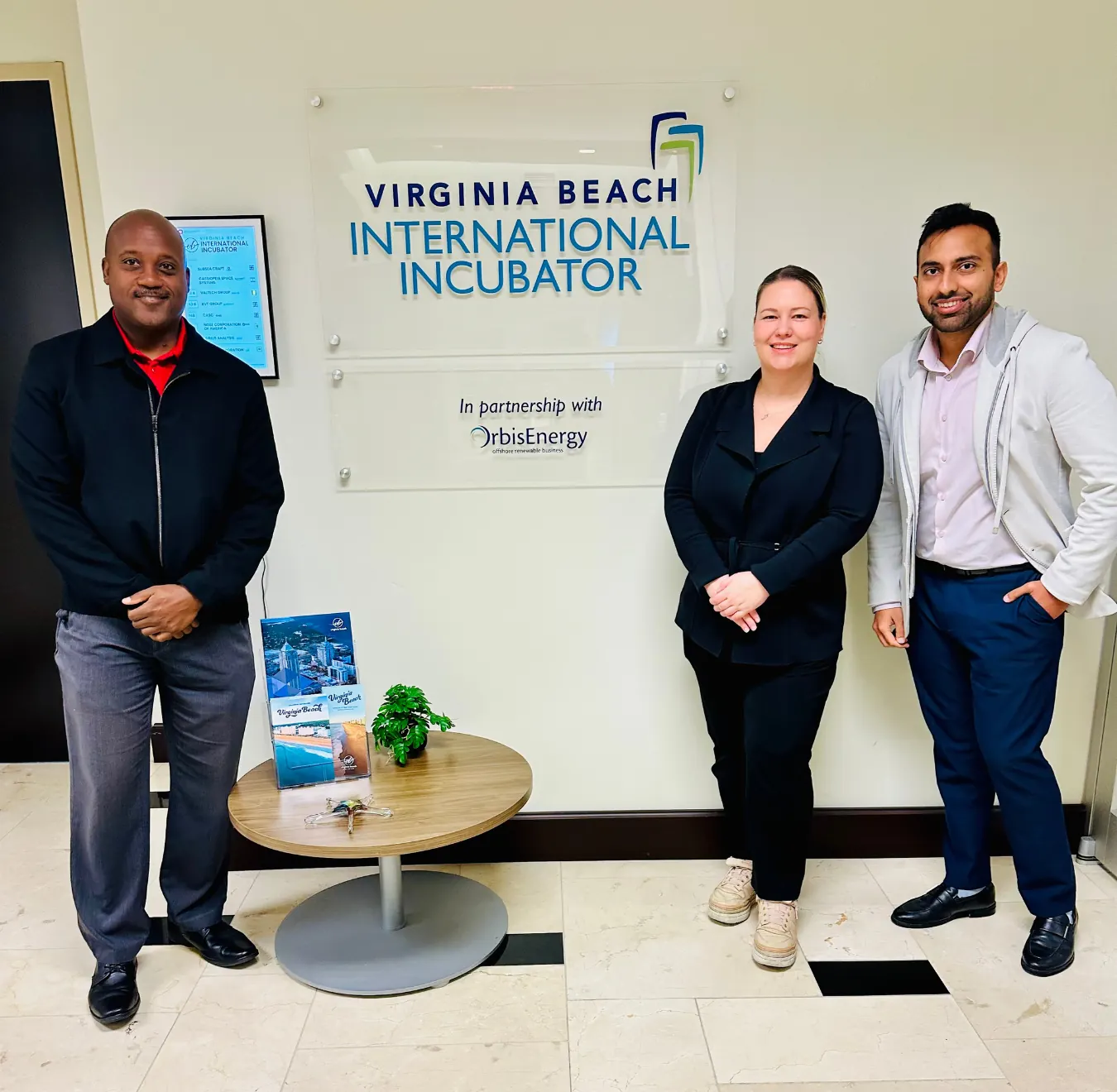 Optii team members inside their Virginia Beach and Hampton Roads office.